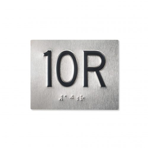 Shows embossed jamb braille with black character and satin stainless background